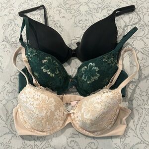 Victoria’s Secret bras, 32C, black, green, cream. Very good shape.